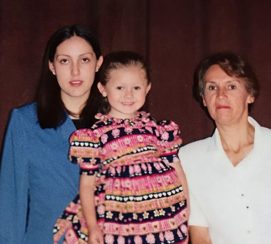 Jael Miranda-Guzman with her daughter and mother at her HS graduation.